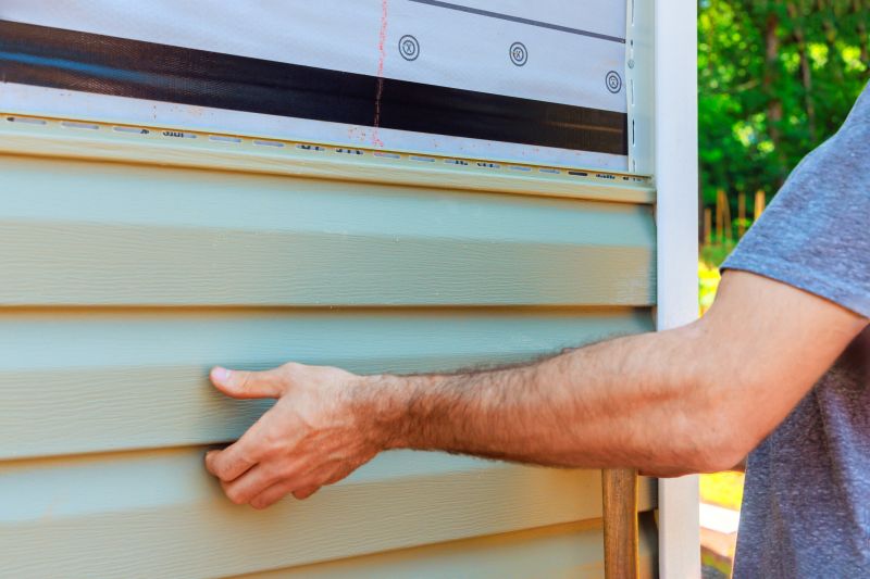 Exterior siding being installed on a home